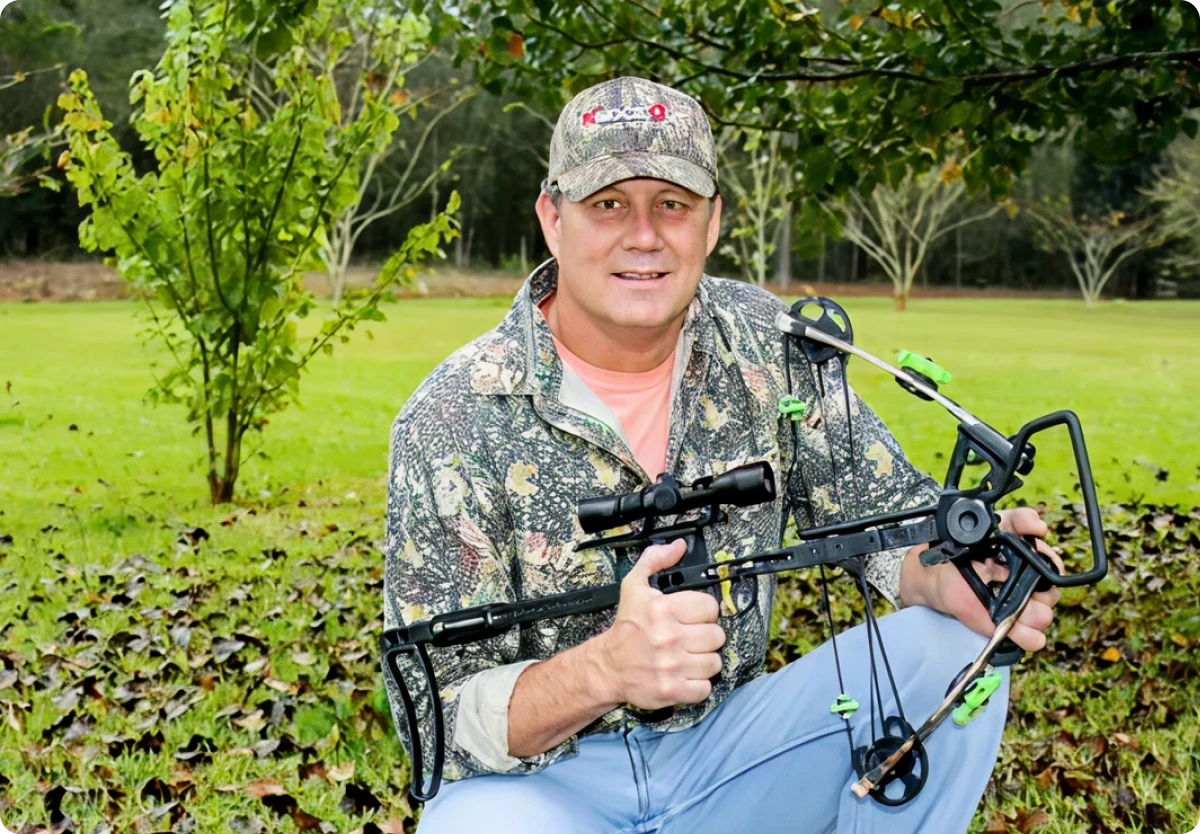 Man in camo with crossbow
